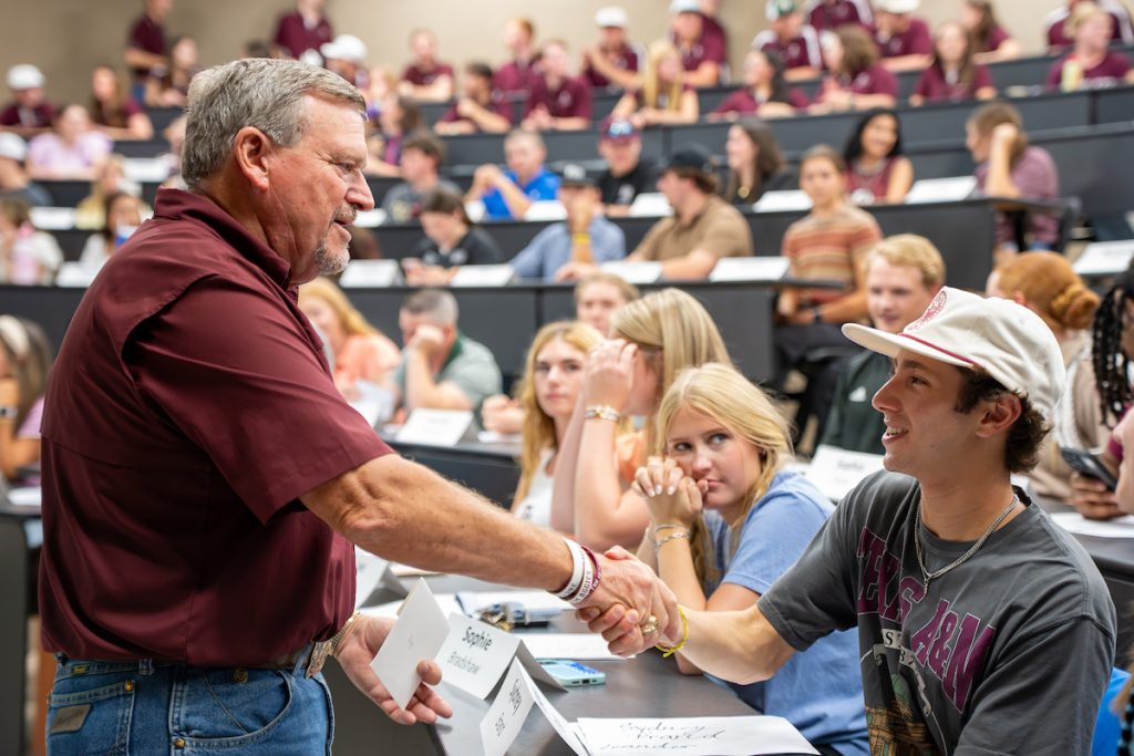 Every Friday afternoon before class starts, professors greet students. This small but meaningful gesture has built a community feel in Texas A&M’s Barbecue class. (Hannah Harrison/Texas A&M AgriLife)