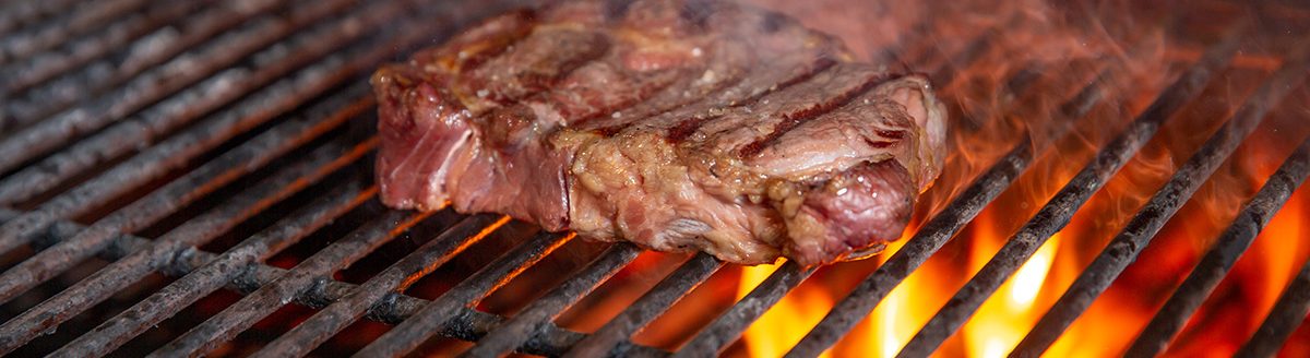 Beef on a grill. (Adobe Stock │ #251550619 - Volodymyr Shcherbak)