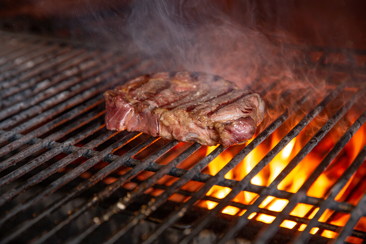 Beef on a grill. (Adobe Stock │ #251550619 - Volodymyr Shcherbak)