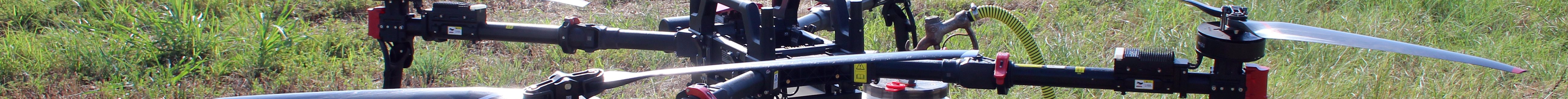 This spray drone was used to desecate sorghum when there was too much rainfall for a ground rig to complete the job. (Journal photo by Lacey Vilhauer.)