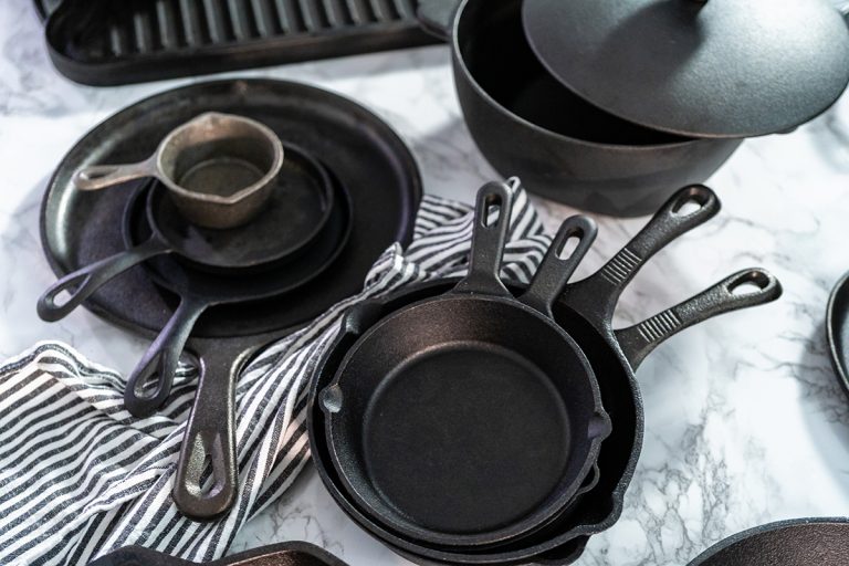 Cast iron pans. (Adobe Stock │ #280317021 - arinahabich)