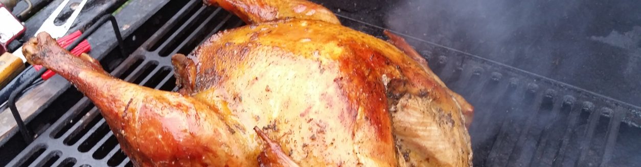 Smoked turkey on bbq grill. (iStock │ #1444566014 - Anthony Jackson)