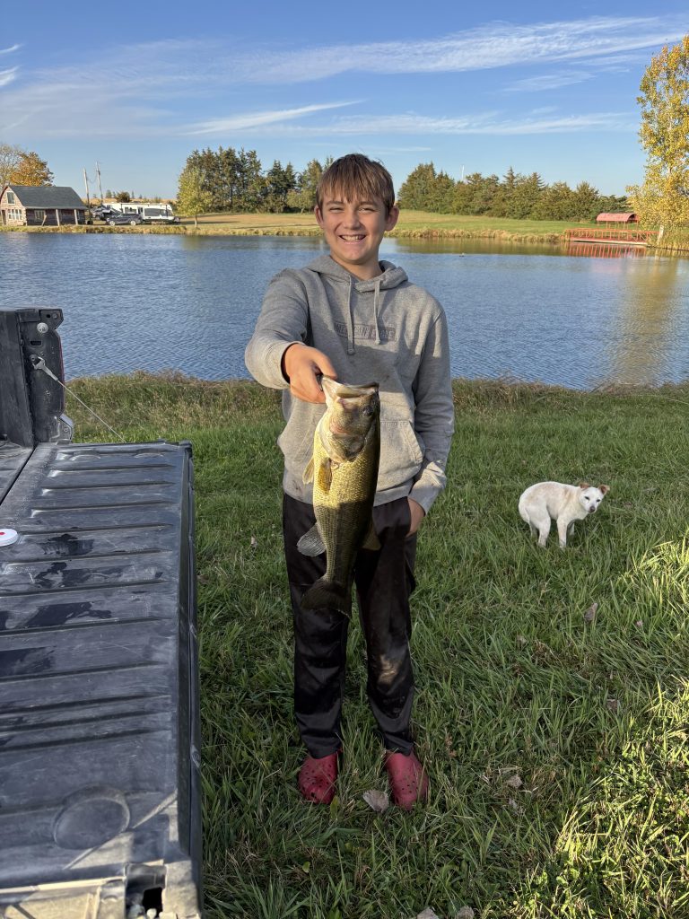 Reece B. of Butler County with his first-place 19” bass from the fall 2025 Iowa 4-H Statewide Fishing Club tournament. (Iowa State University Extension)
