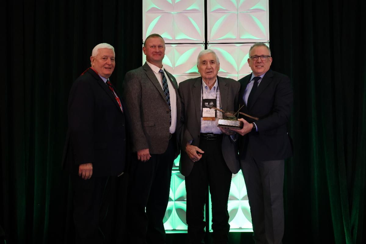 (From left) John Hansen, Nebraska Farmers Union president; Chad Franke, Rocky Mountain Farmers Union president; Dale McCall, former Rocky Mountain Farmers Union president and Meritorious Service Award recipient; and Rob Larew, National Farmers Union president. (Courtesy photo.)