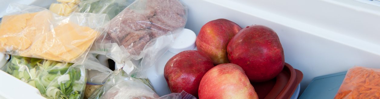 Cooler filled with food for a camping trip. (iStock-#150875029 │ fishysam)