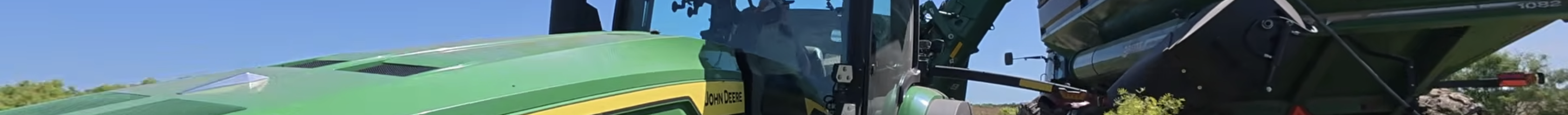 John Deere Grain Cart Stuck in the Mud