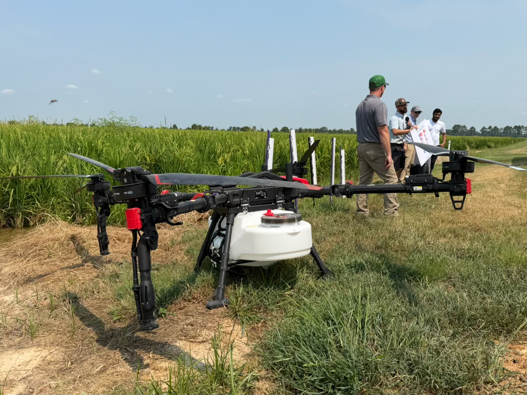 SPRAY DRONE — Research by Jason Davis and Terry Spurlock with the University of Arkansas Division of Agriculture seeks to identify optimum flight speeds, application heights and setups for agricultural spray drones. (UADA photo)
