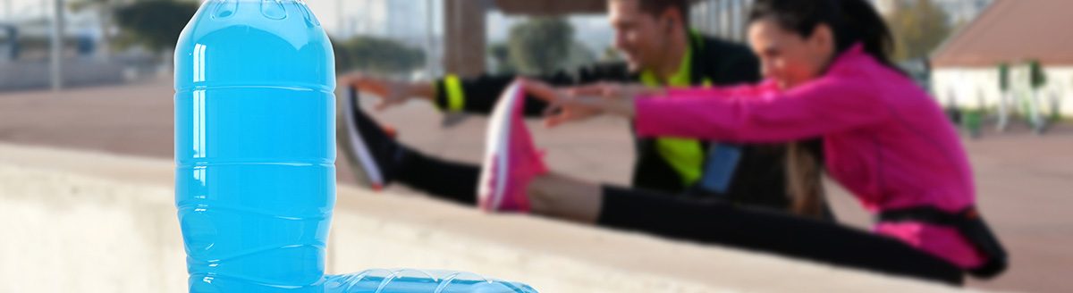 Sports drink on wooden table. (Adobe Stock-#135151772 │ expressiovisual)