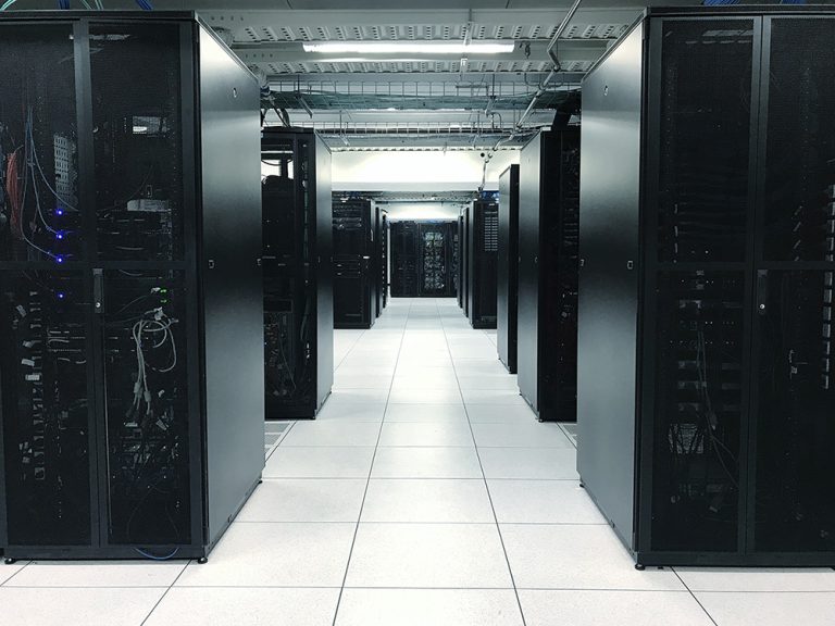 Row of server racks or network device racks in data center. (Adobe Stock-#224325077 │ elbanco)