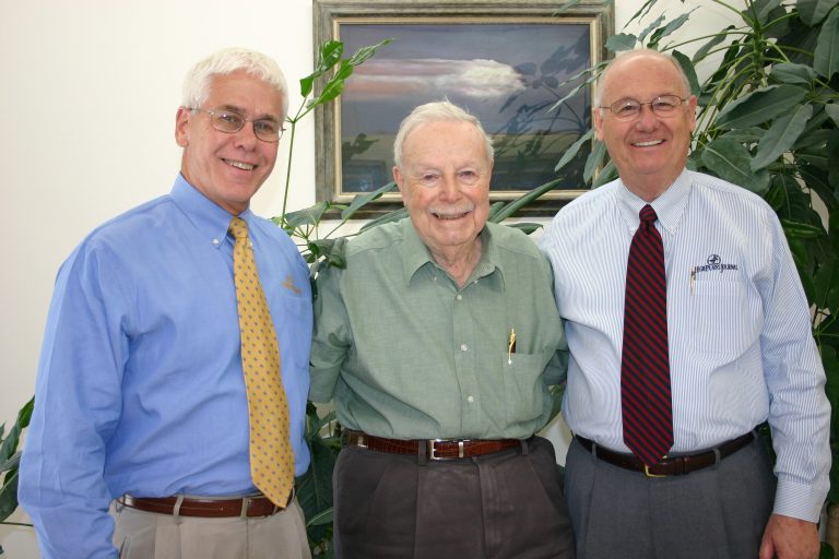 (At right) Retired publisher Duane Ross was remembered for being a strong leader and a gentleman. He is pictured with (left) retired publisher Tom Taylor and the late publisher Joe Berkely. (Journal photo by Kylene Scott.)