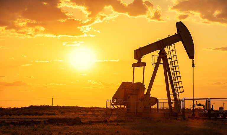 Oil pump oil rig energy industrial machine for petroleum in the sunset background. (Adobe Stock-#315838943 │ Sasint)