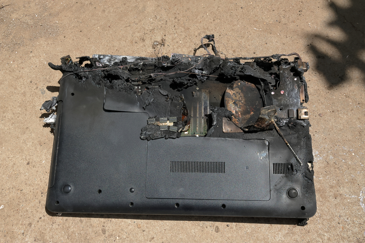 The back of a laptop whose lithium battery caught fire. (iStock-#2286797944 │ Paul San)